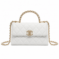 Chanel Quilted Leather Kisslock Flap Crossbody Bag
