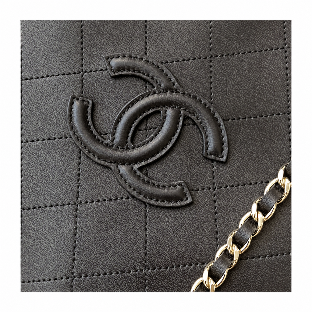 Chanel Small Shopping Tote Black Quilted Lambskin | Oversized Embossed CC & Gold Chain — 21cm